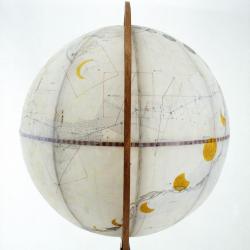 The Globe, as the sun flower sinks behind the horizon, the moon takes her place, reacting and traveling across the sky.