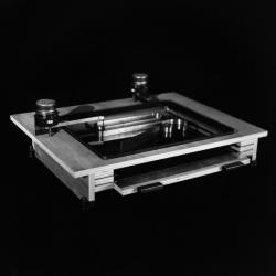 Ripple tank camera, detail: liquid basin, vibration transducers and photographic film tray.